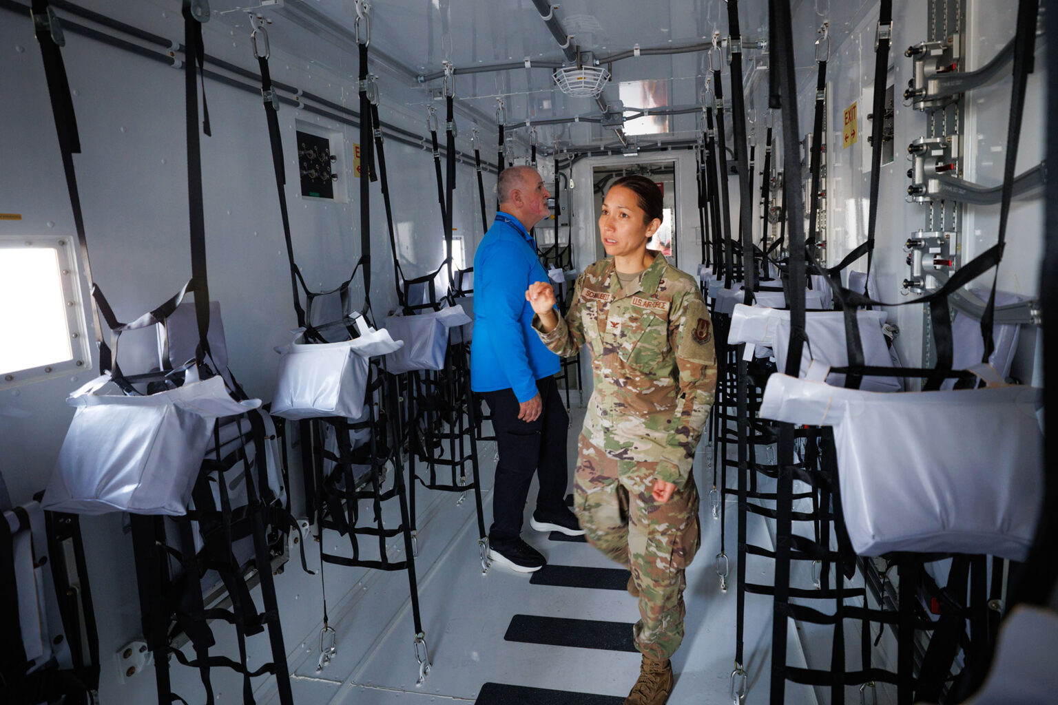Col. Elizabeth Schnaubelt, MD, and Bob Valentine, administrator of C-STARS Omaha, inspect the new Conex unit which was delivered to UNMC on June 13..