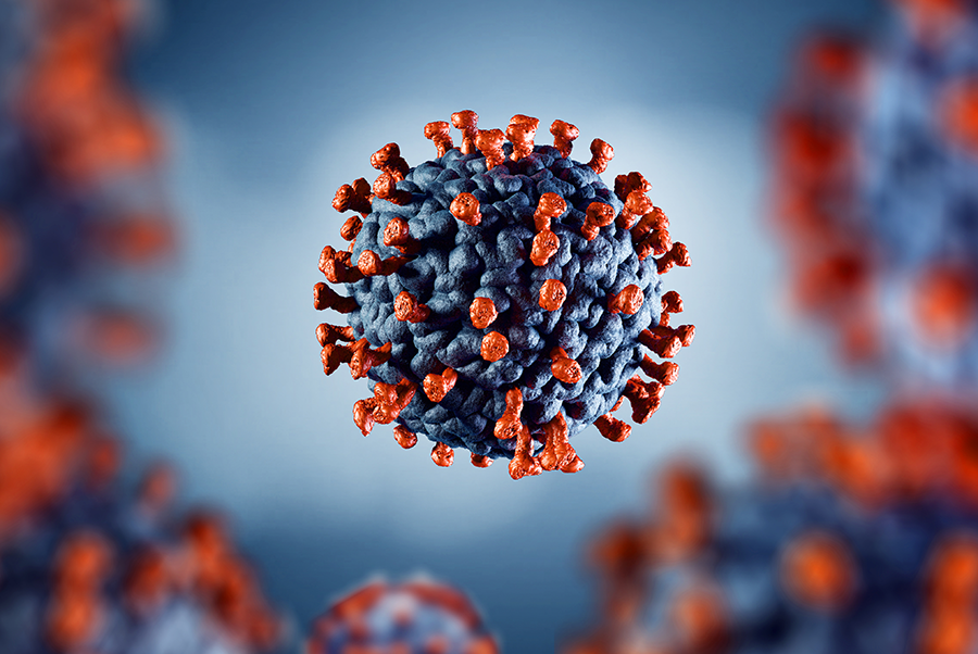 Close-up illustration of a spherical virus with red spike proteins against a soft blue and blurred background.