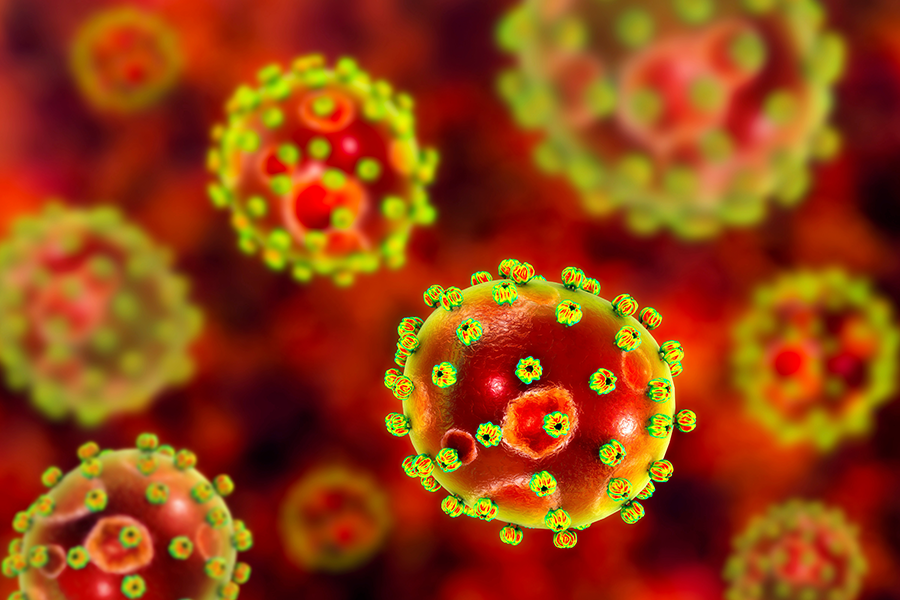 AI Illustration of round viruses with green spike-like proteins against a red, blurred background.