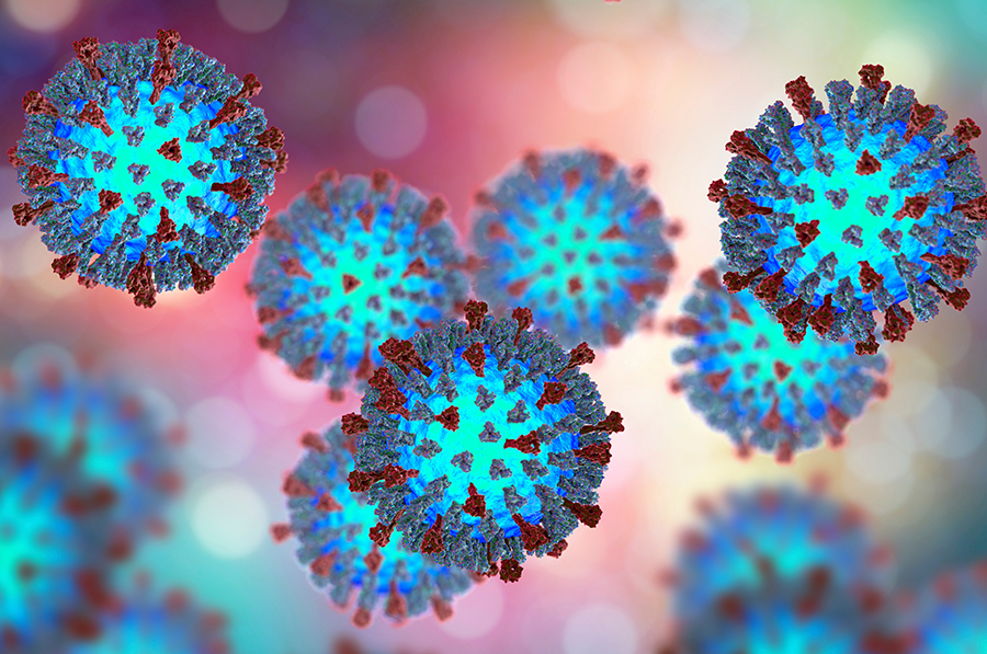 Close-up illustration of round, spiky viruses clustered against a soft, colorful background.