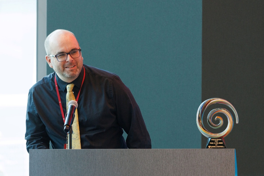 Paul Dye with the Catalyst for Education Award