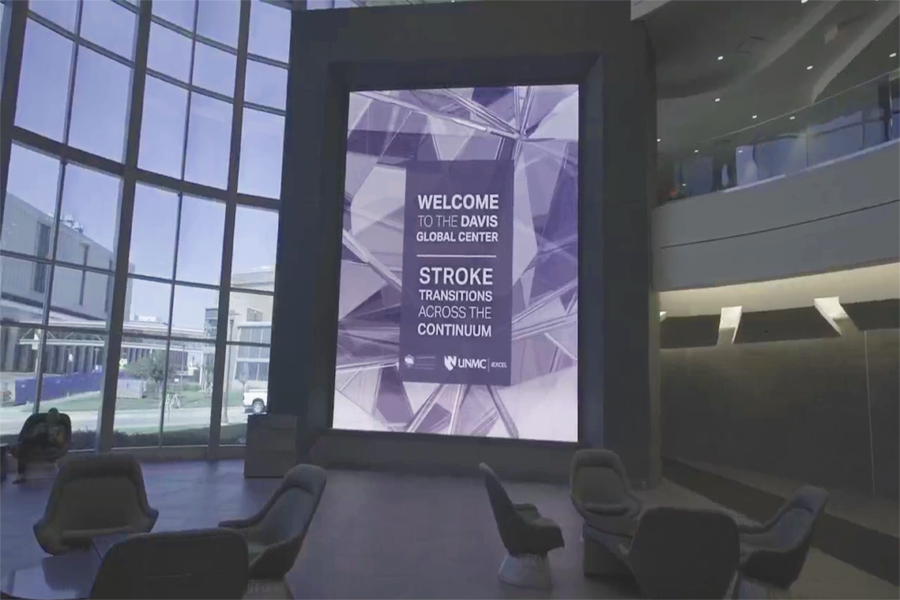 Davis Global Center Atrium featuring a 2-story SONY screen