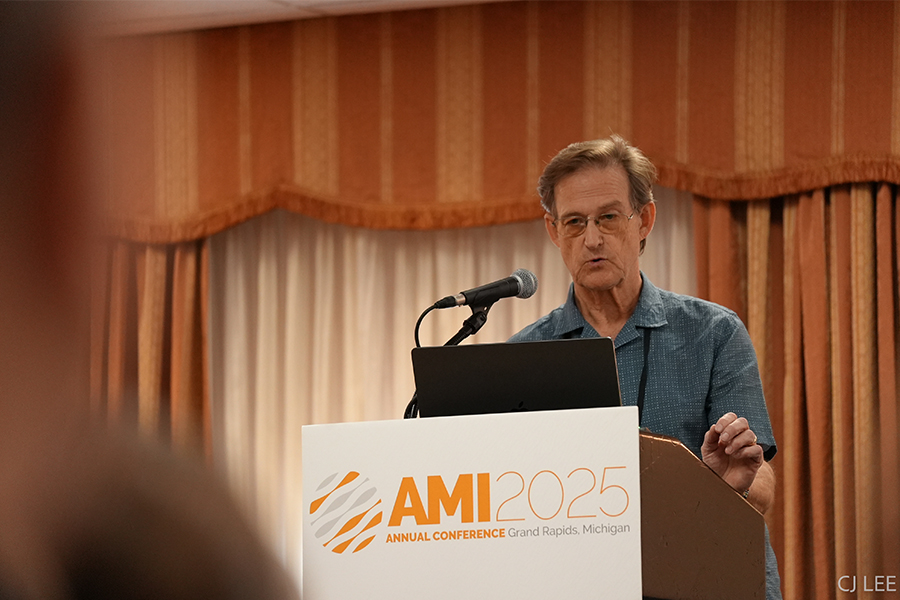 Bill Glass giving a presentation at the AMI Conference