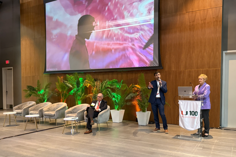 Dr. Pamela Boyers and Michael Hollins presenting at the University of Miami