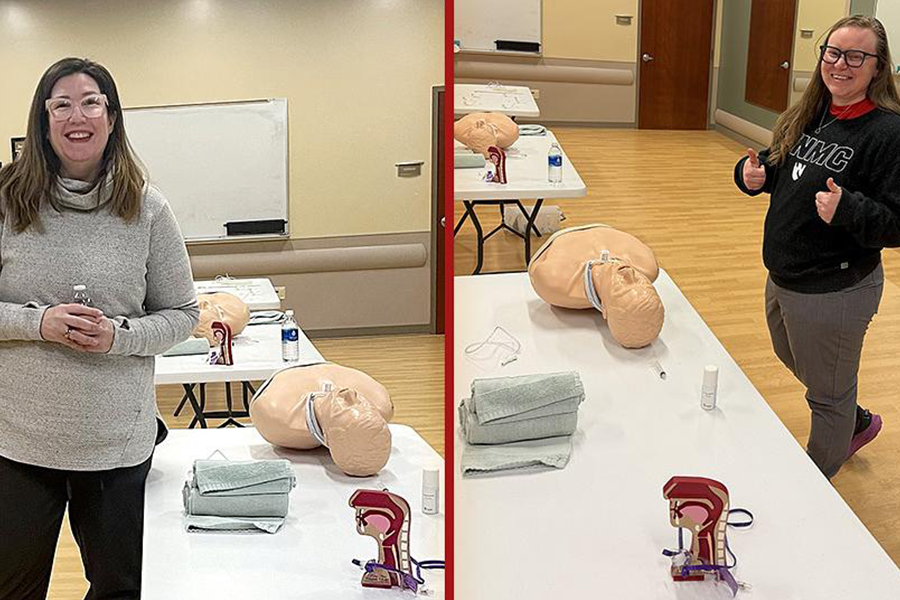instructors stand near manikins with trach tubes