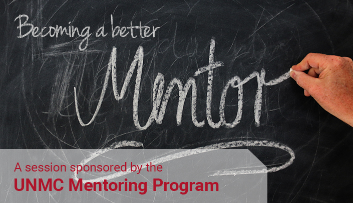 A hand writing on a chalkboard "Becoming a better mentor"