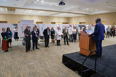 Attendees of the 2025 GME Research Symposium at UNMC listen to a speaker.