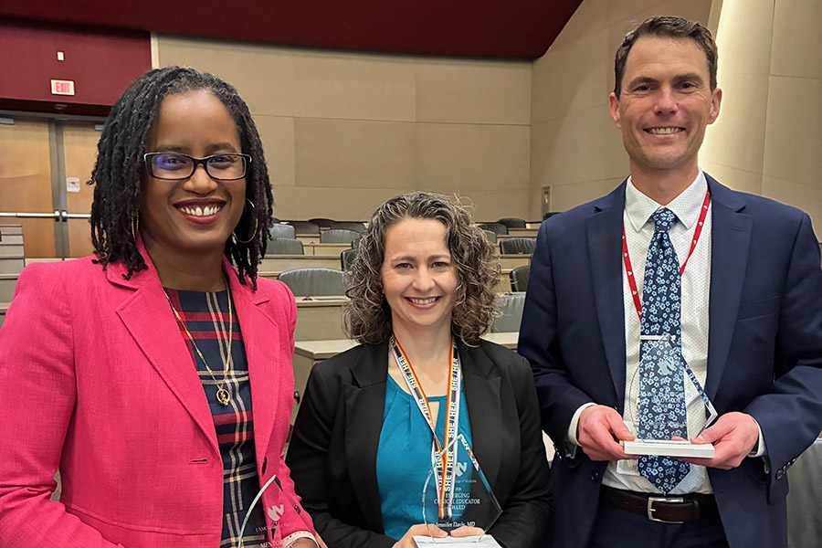 Drs. Jasmine Marcelin, Jen Davis and Chris Smith holding their Medical Education Awards from the UNMC College of Medicine.