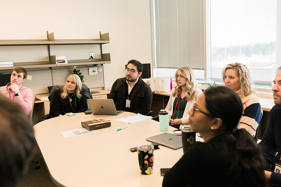 Faculty and fellows in the division of allergy and immunology in a regular meeting.