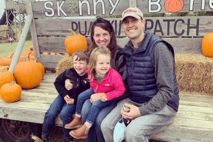 Dr. Brian Delaney, his wife and children enjoying a day at a local pumpkin patch.