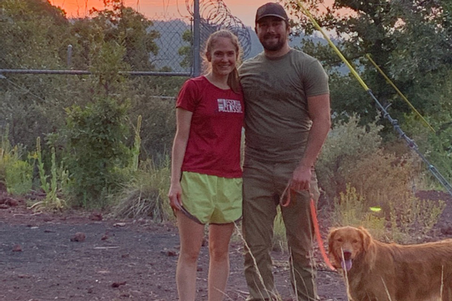 Dr. Jess Fletcher with her husband and dog.