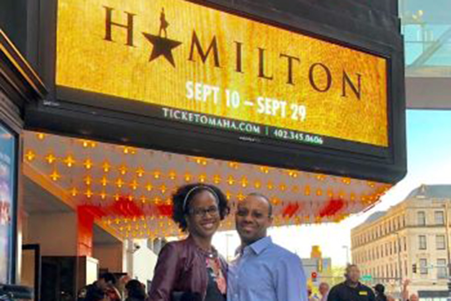 Dr. Jasmine Marcelin and her husband outside a theater