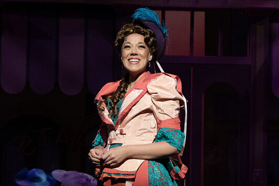 Mackenzie Dehmer is active in the Omaha performing arts community and is pictured here on stage