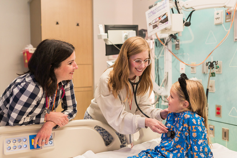 Med-Peds residents working with a UNMC faculty member.