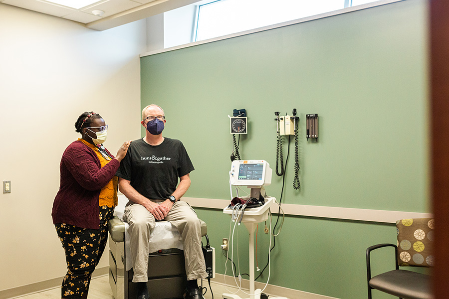 A resident seeing a patient at Midtown Clinic