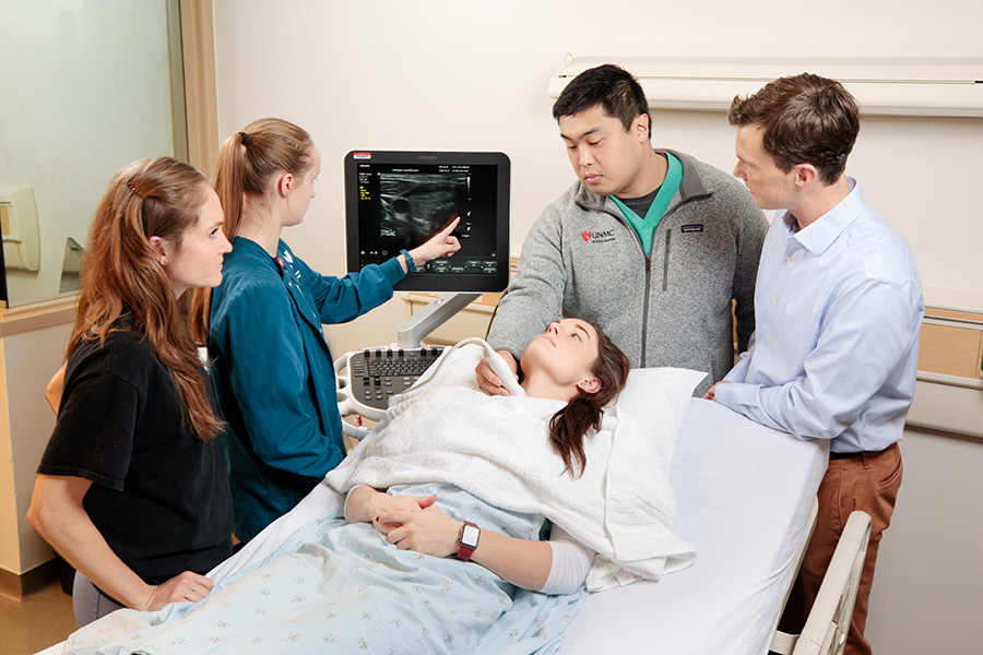 Residents at UNMC learning about point-of-care ultrasound (POCUS).