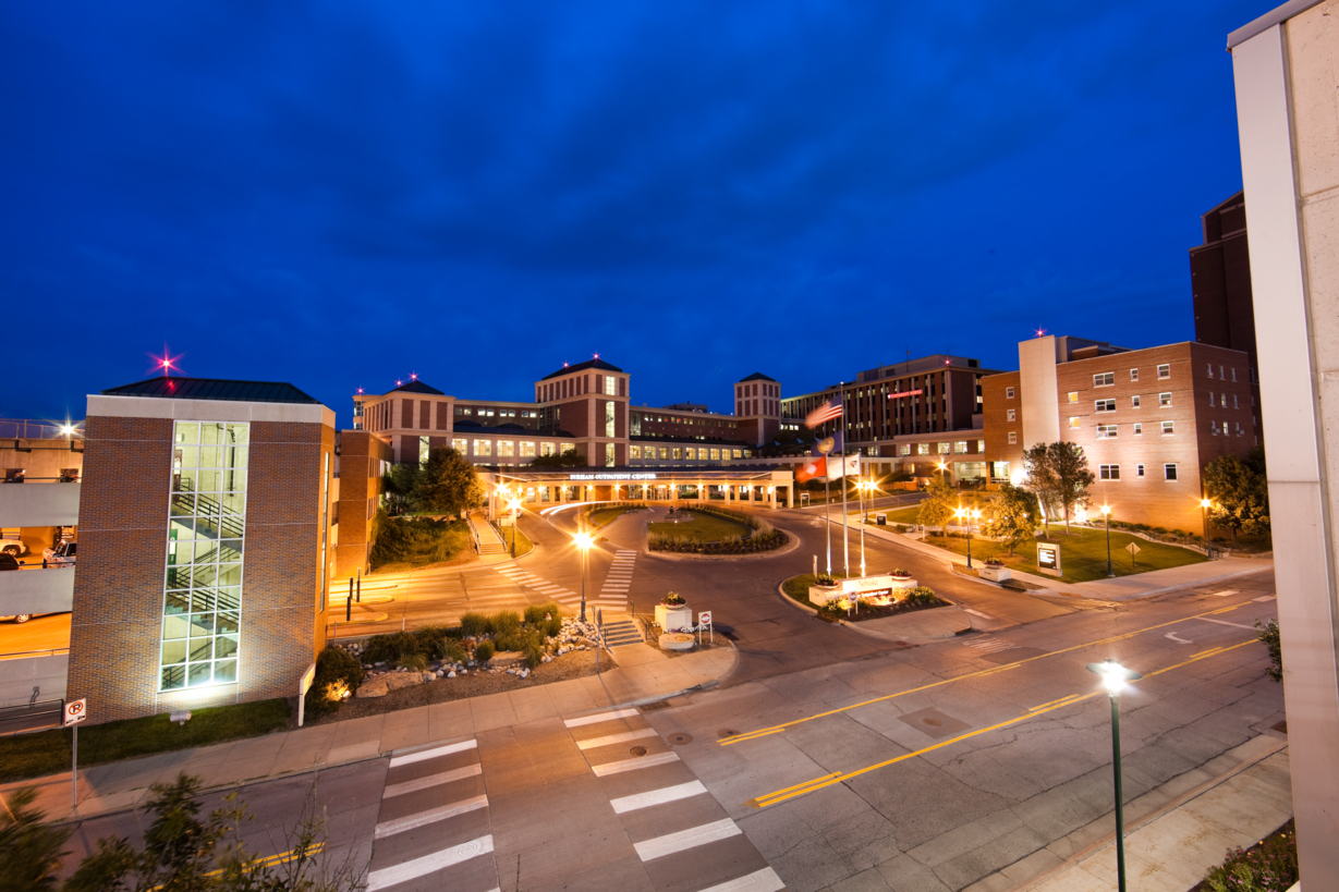 The exterior of the Nebraska Medical Center in the evening.