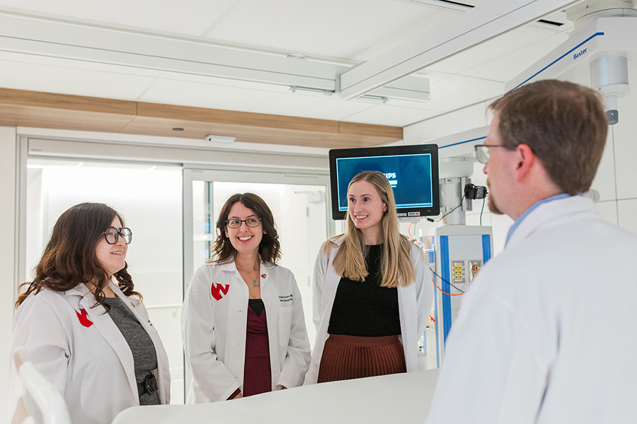 Infectious Diseases fellows rounding at UNMC's main campus with a faculty member