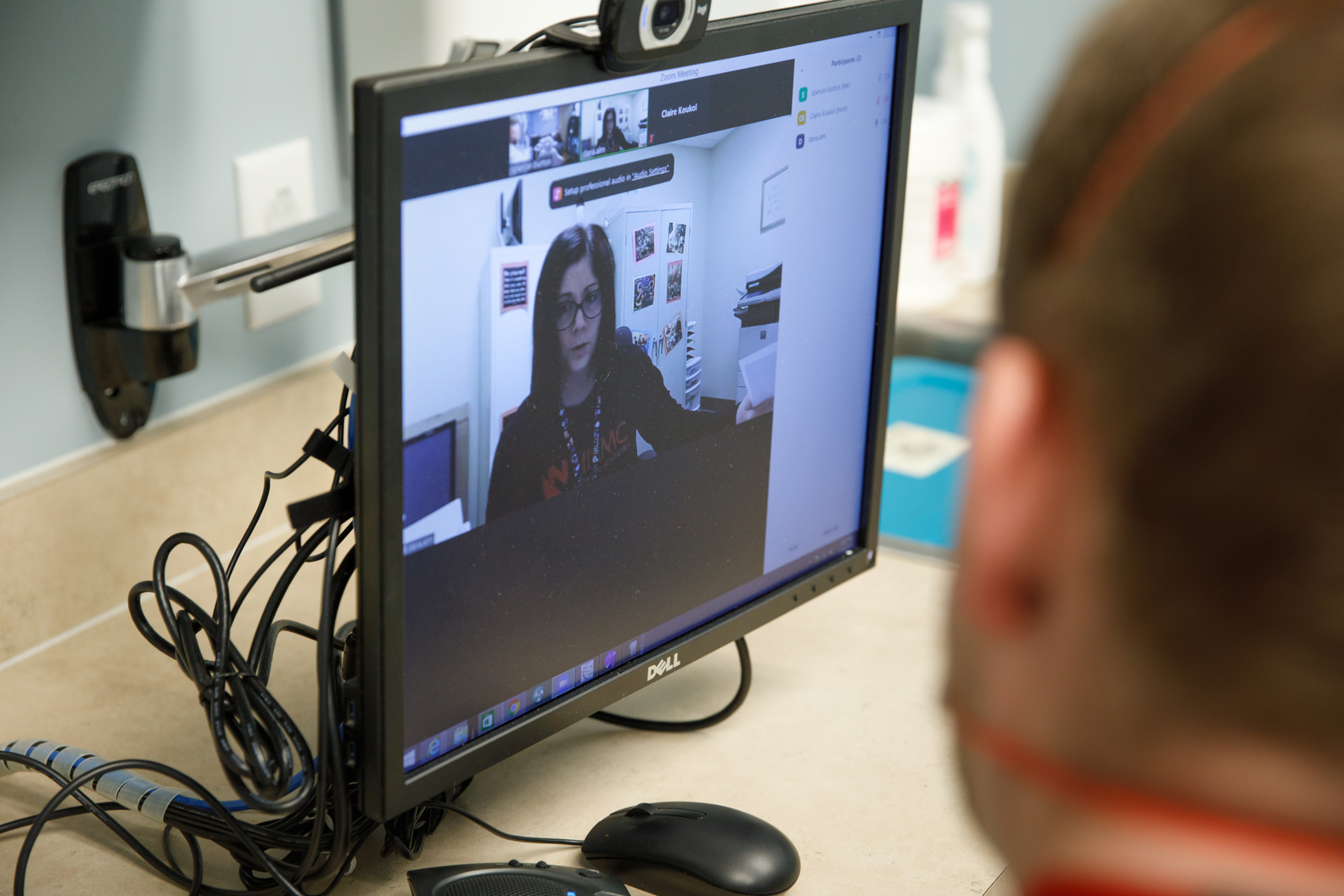 A patient talking with a provider on a telehealth visit.
