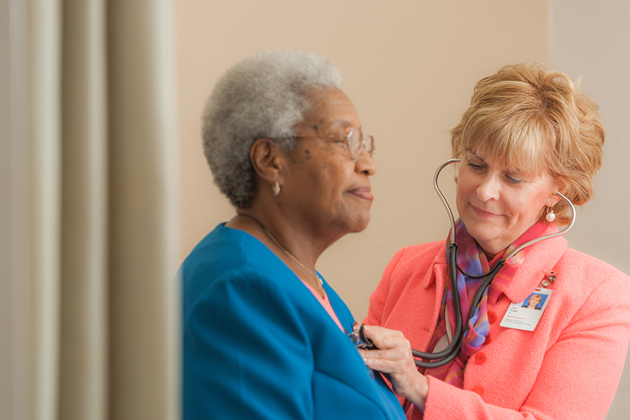 A patient being examined by their oncology and hematology physician.