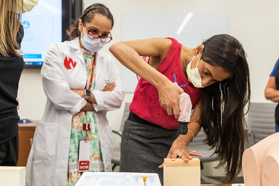 UNMC Department of Internal Medicine Oncology & Hematology fellows learning bone marrow biopsy tools and techniques.