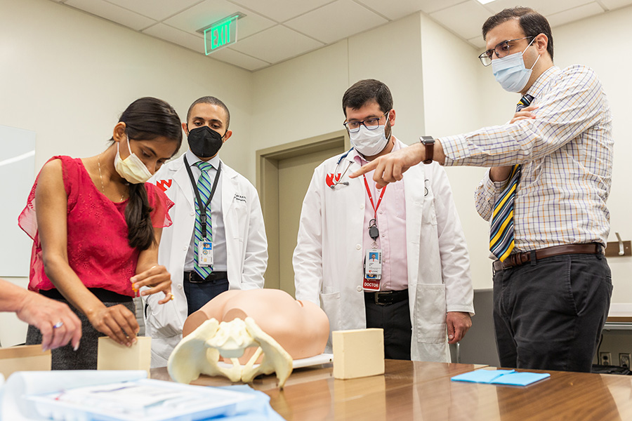 UNMC Department of Internal Medicine Oncology & Hematology fellows learning bone marrow biopsy tools and techniques.