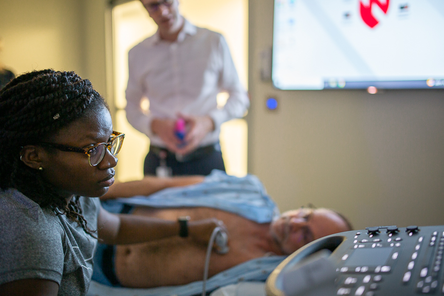 Residents learn from faculty in a POCUS class