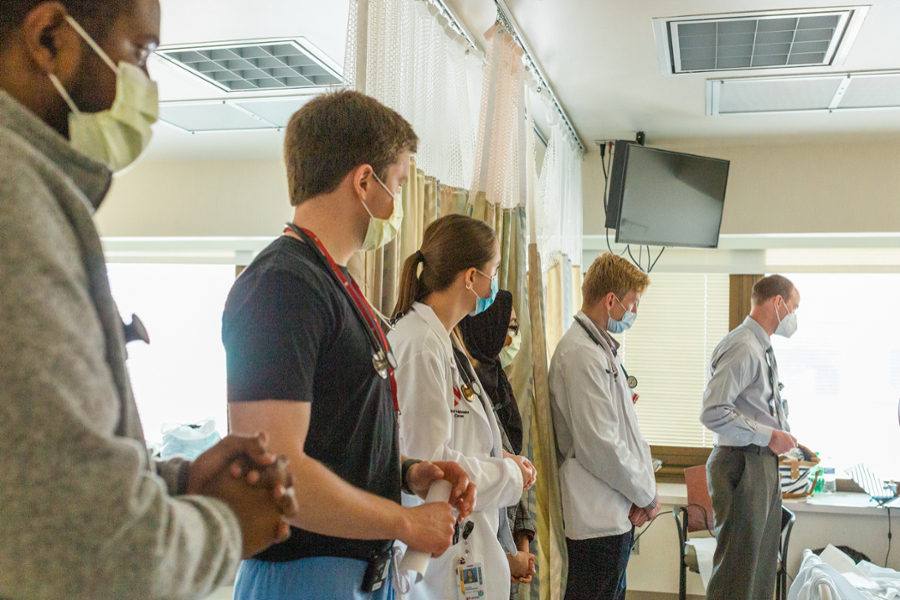 UNMC Internal Medicine residents round on an inpatient ward with a faculty member.