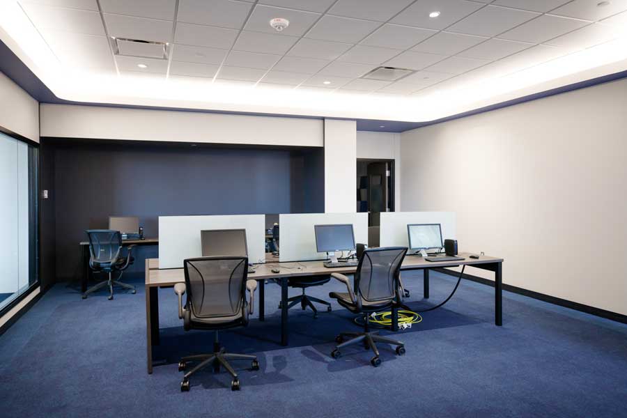 Technology commons, room with computers on desks.