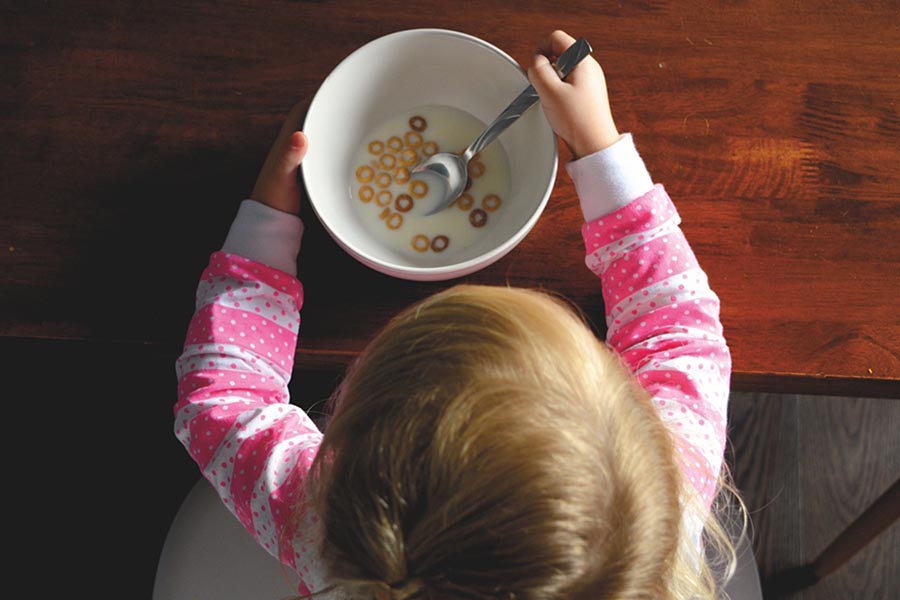 Child at table with cereal bowl, Credit - Stock Snap, Pixabay.