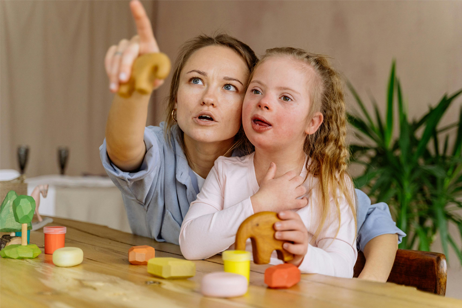 Provider works with child with Down Syndrome.