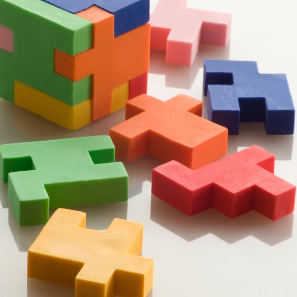 Colorful 3D puzzle pieces on a table