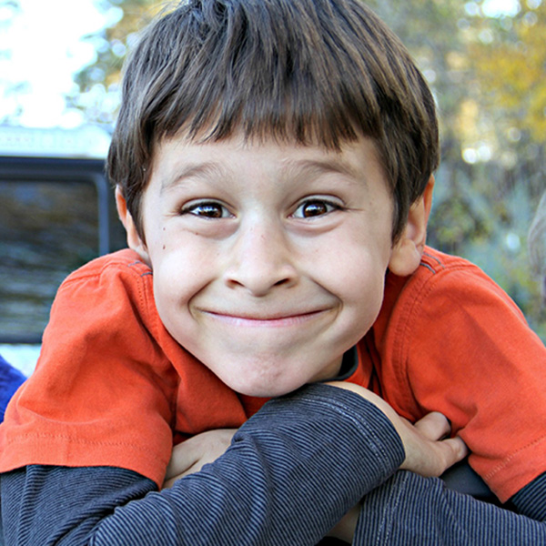 One young boy looking excitedly at the camera, Credit White77 - Pixabay.
