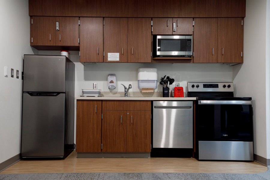 MMI's apartment simulator kitchen and laundry space.