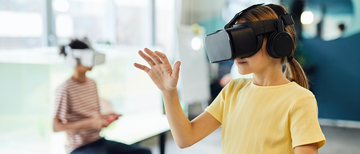 Youth wearing VR headsets merging therapy and fun in a physical therapy research session, Credit Vanessa Loring Pexels.