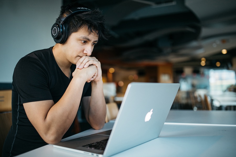 Man reading on computer