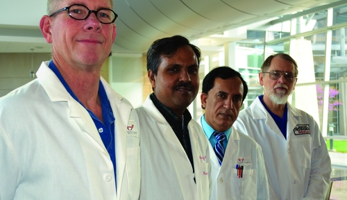 From left: Tony Hollingsworth, Ph.D., Rakesh Singh, Ph.D., Surinder Batra, Ph.D., and Keith Johnson, Ph.D., tackle pancreatic cancer.
