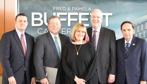 From left, Brian Hastings, Joe Graham, Susie Buffett, Ken Cowan, M.D., Ph.D., and Chancellor Harold M. Maurer, M.D., mark the naming of the Fred & Pamela Buffett Cancer Center.