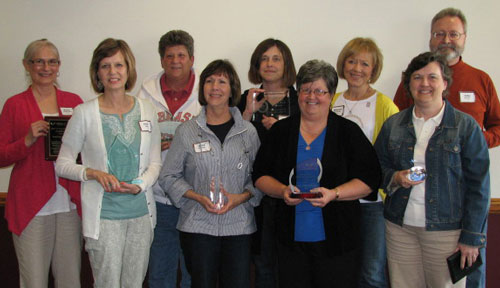 Individual award winners at the College of Nursing faculty-staff awards. Pictured, from left: Karen Schumacher, Paula Schulz, Barb Sand, Roberta Kroeger, Cathy Binstock, Connie Miller, Maureen Oberdorfer, Cara Mouw and John Barrier. Not pictured are: Steph Burge and Amy Herboldsheimer.