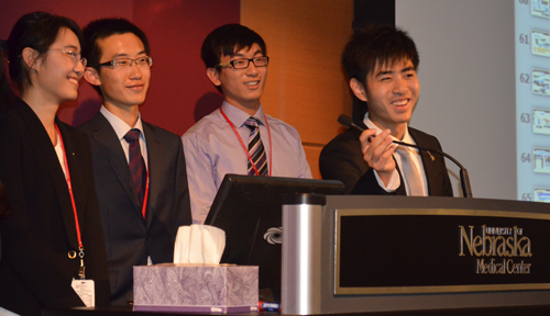 International students speak at the mini-symposium.