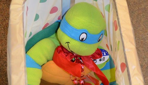 Toys, like this Teenage Mutant Ninja Turtle from an earlier drive, gift cards and other donations are needed.