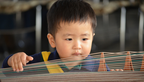 A young visitor to 2013's Chinese Cultural Fair. The 2014 event will be held Friday.