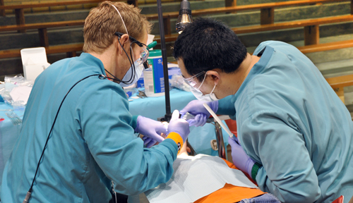 In 2013, College of Dentistry students, faculty and staff participated in the dental sealant program in Fairbury, Neb. Next week, college personnel will travel to Butte to continue the effort. (Photo by Margaret Cain.)