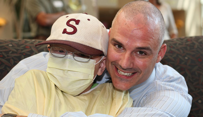 Ten-year-old Isaac Gibson was thrilled to get the chance to shave the head of his oncologist, Don Coulter, M.D. Some of Dr. Coulter's research has been supported by money raised for the St. Baldrick’s Foundation.