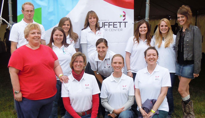 Members of the accelerated BSN Class of 2015 at the Cattlemen's Ball. Back row, from left: Justin Blomstedt, Cassandra Edwards, Brooke Housh, Kirsten Cross, Jennifer Steele, Jessica Creel, Megan Wanner and Melissa Snyder. Front row, from left: Instructor Dana Samson (standing), Marsha Schramm, Julia Davis and Amaris Hofer.