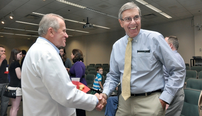 Earlier this month, the UNMC Adult Restorative Dentistry Department of the College of Dentistry hosted a retirement reception honoring Larry Haisch, D.D.S. Dr. Haisch, pictured at right with Stan Harn, D.D.S., retires after 35 years of service.