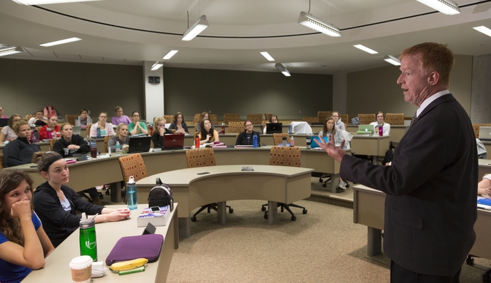 Michael Huckabee, Ph.D., lecturer in this photo, is one of the key coordinators of the Sept. 10-11 conference looking at the evolving role of physician assistants.