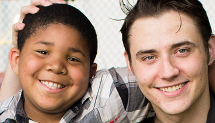 Darius, a participant at the Kids Can Community Center, and Ben, his mentor.