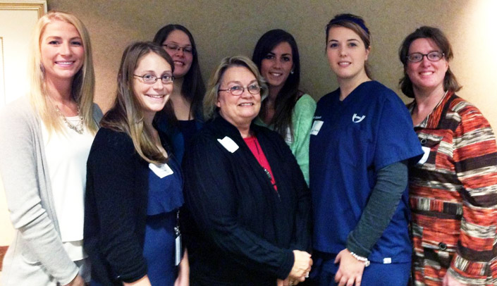 UNMC Faculty Women’s Club Scholarship recipients were honored at a recent luncheon.  Pictured above are five of the nine recipients:  Erica Jasa, College of Dentistry; Heather Talbott, Graduate Studies; Susan Hageman, College of Medicine; Pat Leuschen, Ph.D., (retired), FWC president; Alexandra Dugan, College of Pharmacy; Charlene Vance, School of Allied Health Professions; and Mary Gallagher-Jansen, M.D., Internal Medicine and FWC executive board member. Dr. Leuschen estimates that approximately $250,000 supporting student scholarship has been contributed over the years by the organization.  Recipients not pictured:  Morgan Mowrey, Dental Hygiene; Jacquelyn Ryan, Nursing; Allison Anderson, Nursing; and Bianca Christensen, Public Health.