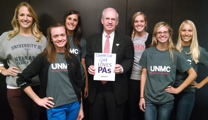 UNMC Chancellor Jeffrey P. Gold, M.D., gets into the Physician Assistant Week spirit with PA students (from left) Cassie Gehling, Tracy Farrell, Kate Edwards, Jess Cannon, Abbey Harris and Kirsten Seidler.